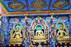 Gold plated statues in Namdroling Monastery